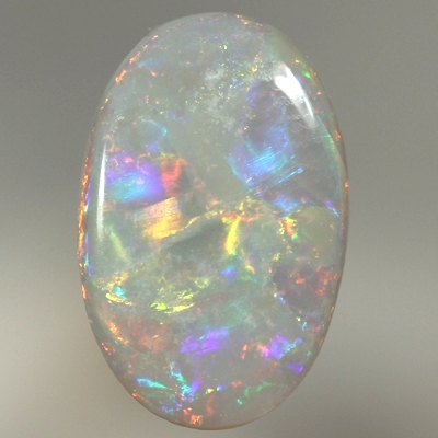 SOLID SEMI BLACK OPAL Bright rolling flashes, red, neon yellow and green